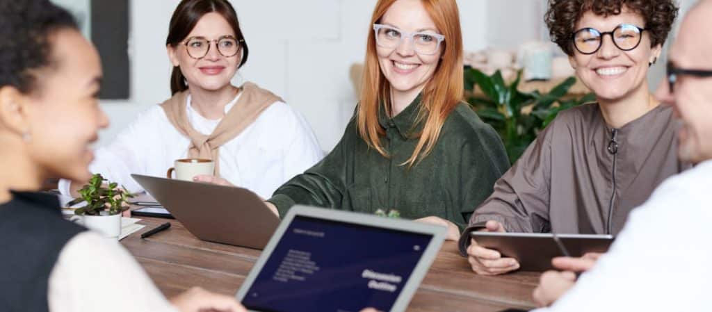 group of online students laugh at professor