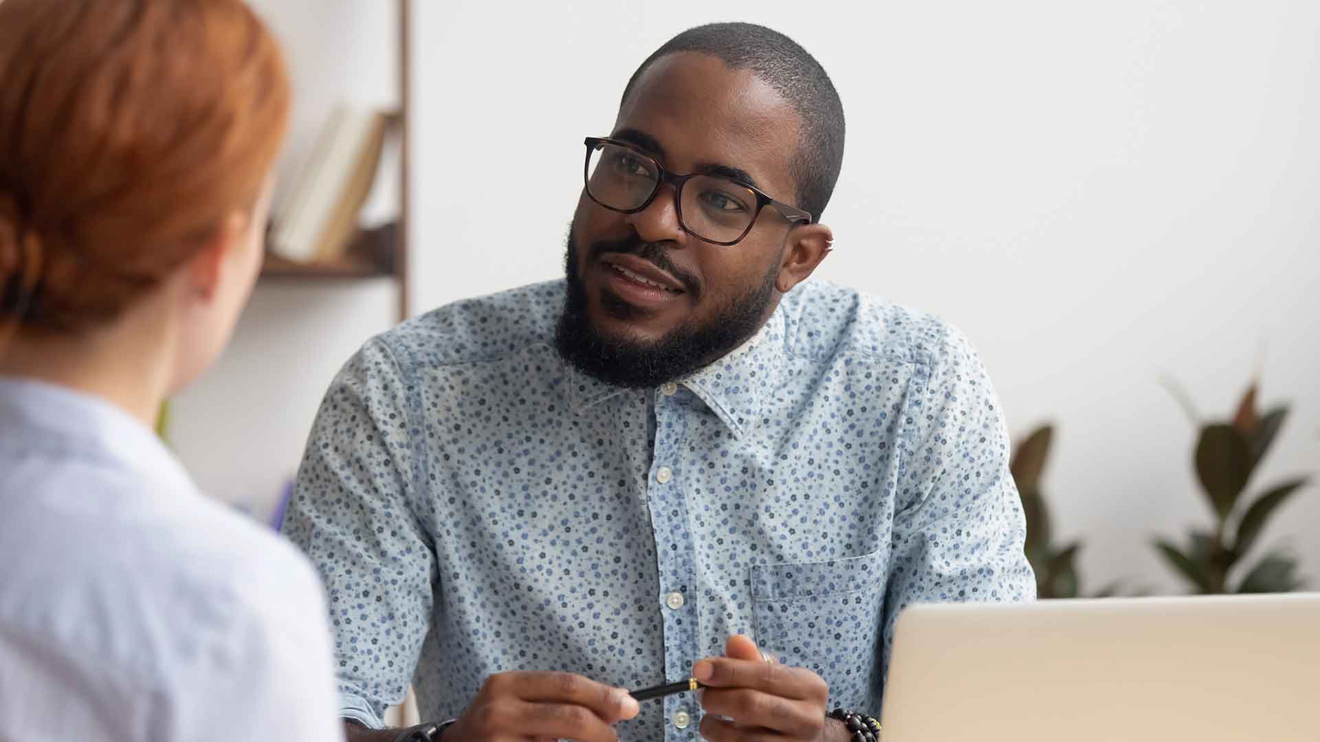 human services worker listens intently to client issues
