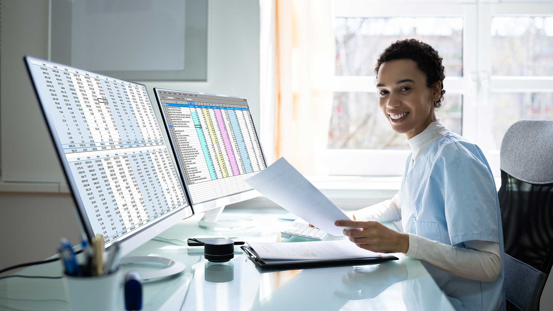 medical records rechnician reviews patient files and reconciles accounts using technology